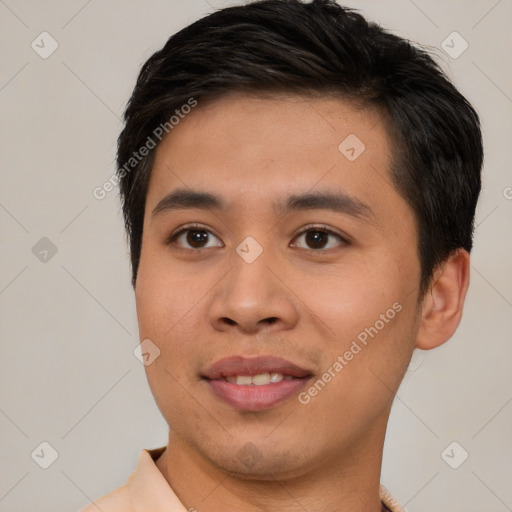 Joyful white young-adult male with short  black hair and brown eyes