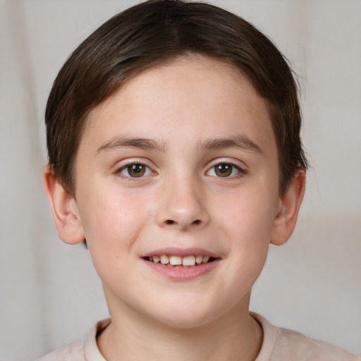 Joyful white child female with short  brown hair and brown eyes