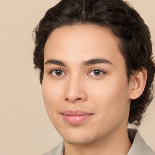 Joyful white young-adult male with medium  brown hair and brown eyes