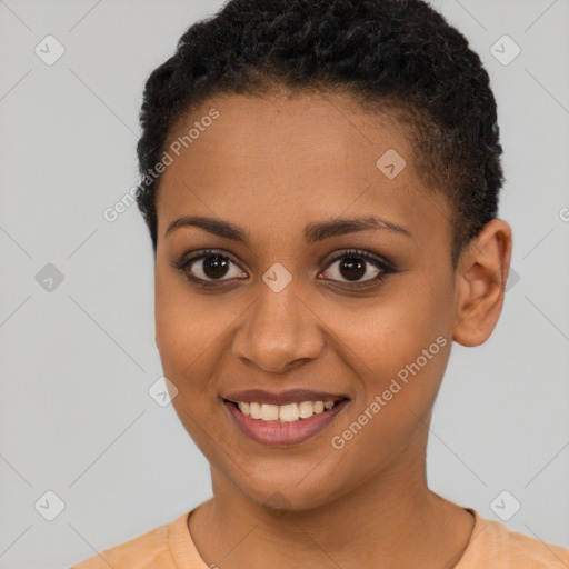 Joyful black young-adult female with short  brown hair and brown eyes