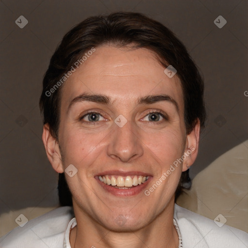 Joyful white adult female with short  brown hair and brown eyes