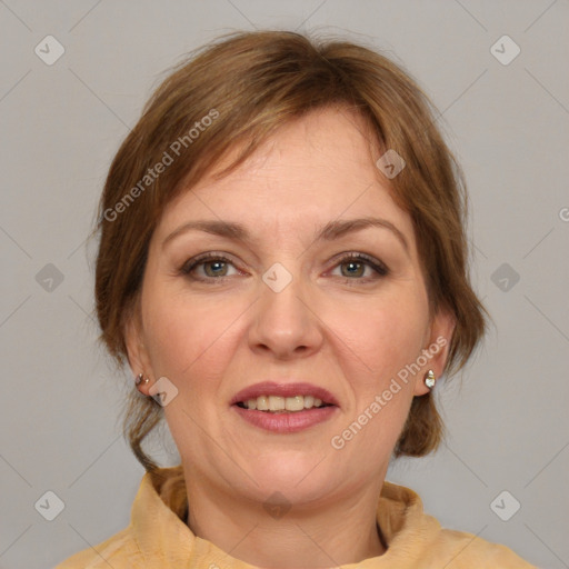 Joyful white adult female with medium  brown hair and brown eyes