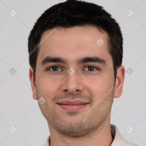 Joyful white young-adult male with short  brown hair and brown eyes