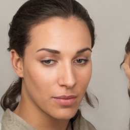 Neutral white young-adult female with medium  brown hair and brown eyes