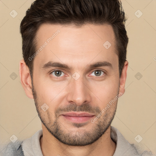 Joyful white young-adult male with short  brown hair and brown eyes