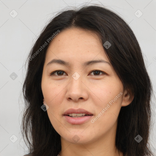 Joyful white adult female with long  brown hair and brown eyes