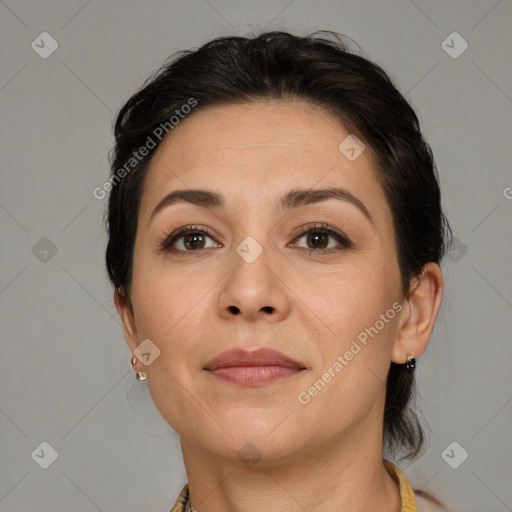 Joyful white adult female with medium  brown hair and brown eyes