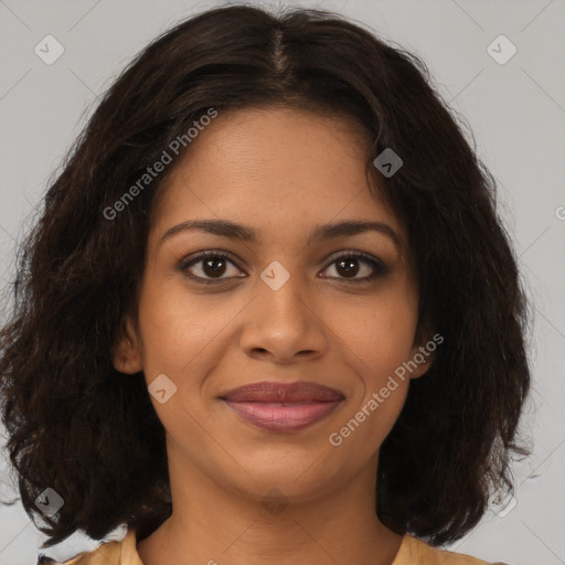 Joyful black young-adult female with medium  brown hair and brown eyes