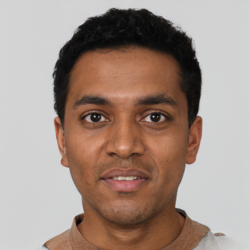 Neutral black young-adult male with short  black hair and brown eyes