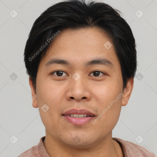 Joyful asian young-adult male with short  brown hair and brown eyes