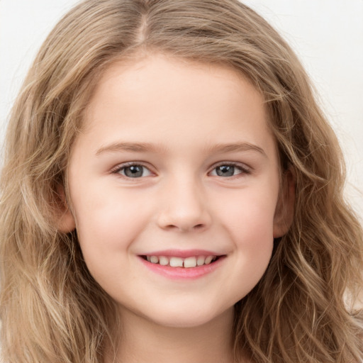 Joyful white child female with long  brown hair and grey eyes