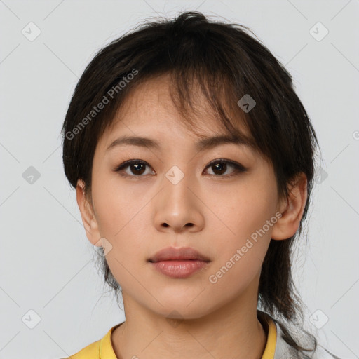 Neutral asian young-adult female with medium  brown hair and brown eyes