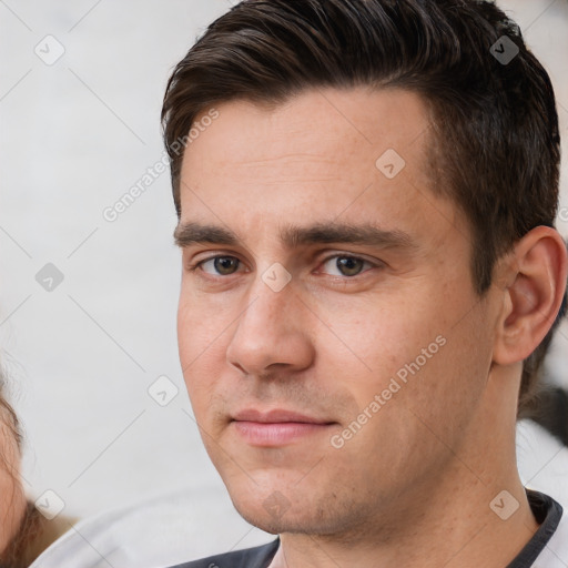 Neutral white young-adult male with short  brown hair and brown eyes