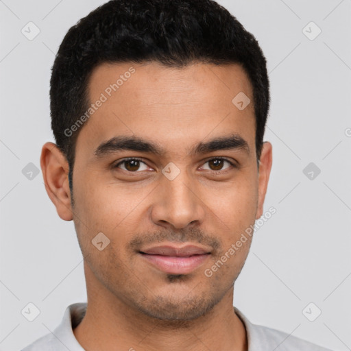 Joyful latino young-adult male with short  brown hair and brown eyes