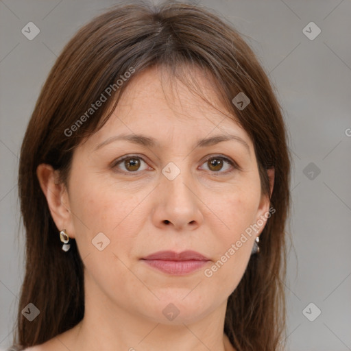 Joyful white adult female with medium  brown hair and brown eyes