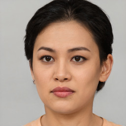 Neutral asian young-adult female with short  brown hair and brown eyes