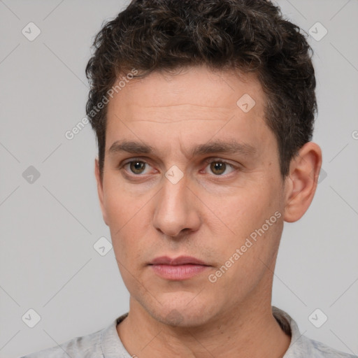 Neutral white adult male with short  brown hair and brown eyes