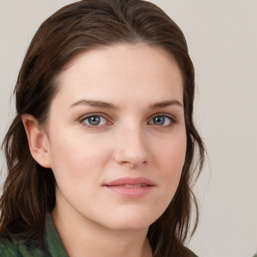 Neutral white young-adult female with long  brown hair and grey eyes