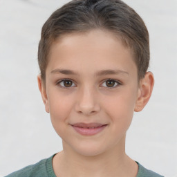 Joyful white child female with short  brown hair and brown eyes