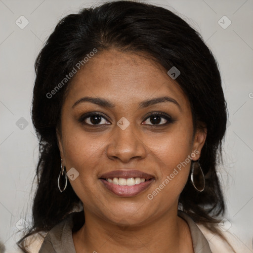 Joyful black young-adult female with medium  brown hair and brown eyes