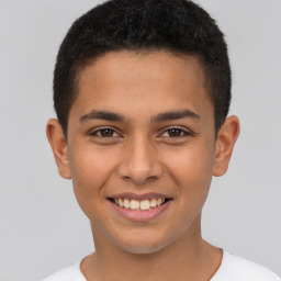 Joyful latino young-adult male with short  brown hair and brown eyes