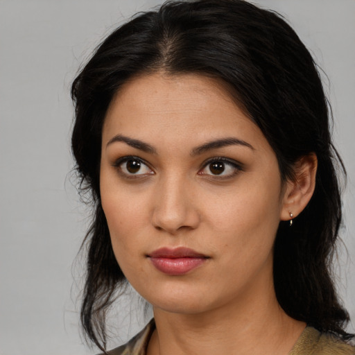 Neutral latino young-adult female with medium  black hair and brown eyes