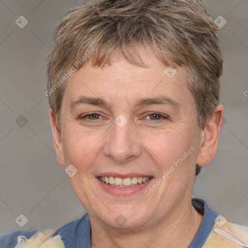 Joyful white adult male with short  brown hair and grey eyes