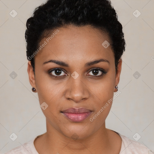 Joyful black young-adult female with short  black hair and brown eyes