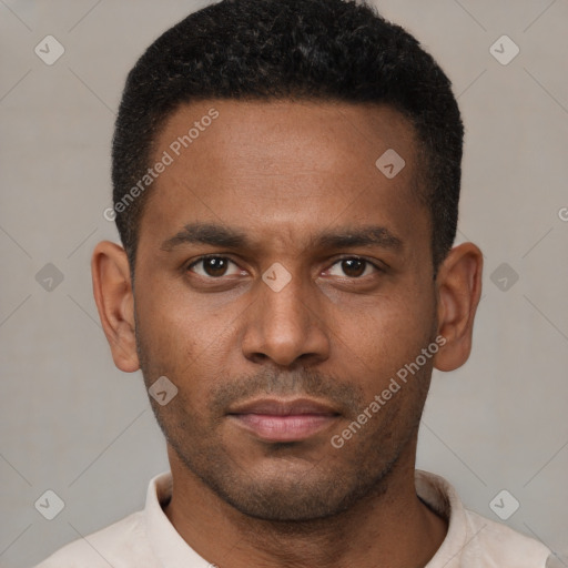 Neutral latino young-adult male with short  brown hair and brown eyes