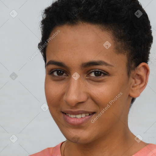 Joyful latino young-adult female with short  brown hair and brown eyes