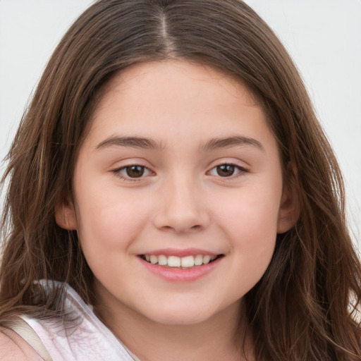 Joyful white child female with long  brown hair and brown eyes