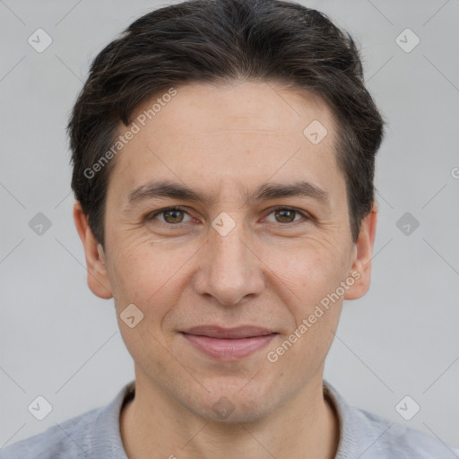 Joyful white adult male with short  brown hair and brown eyes