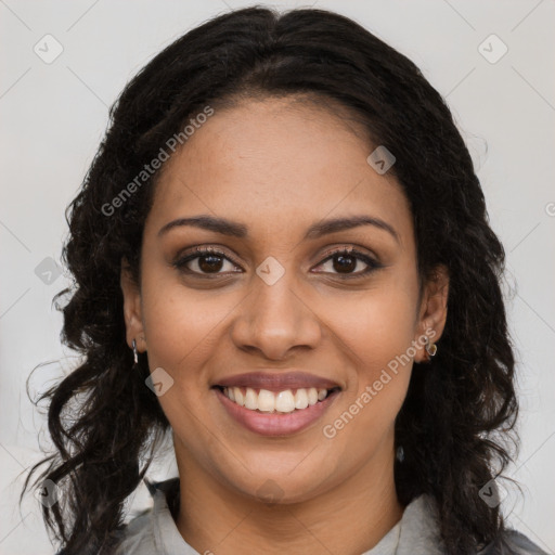 Joyful black young-adult female with long  brown hair and brown eyes