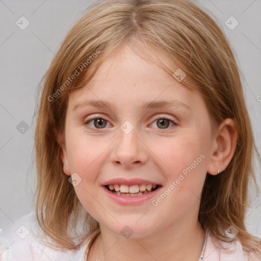 Joyful white child female with medium  brown hair and blue eyes