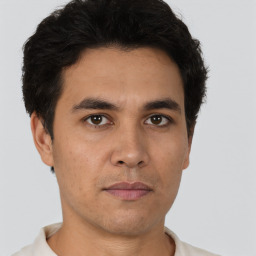 Neutral asian young-adult male with short  brown hair and brown eyes