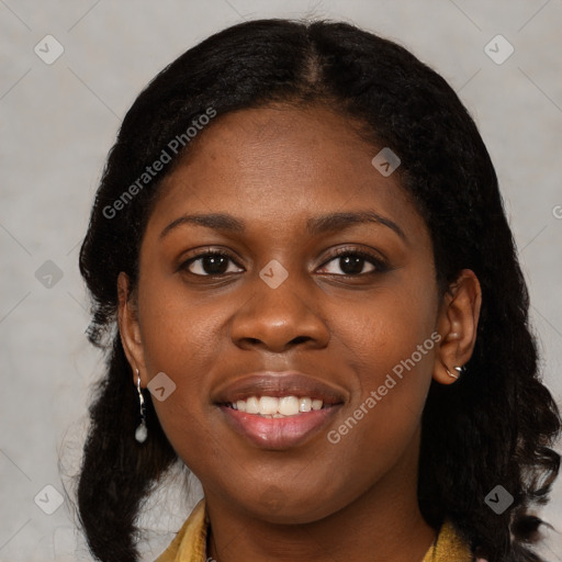 Joyful black young-adult female with medium  black hair and brown eyes