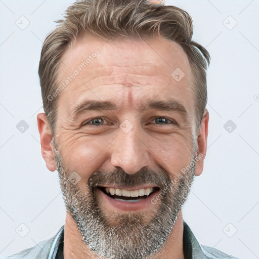 Joyful white adult male with short  brown hair and grey eyes