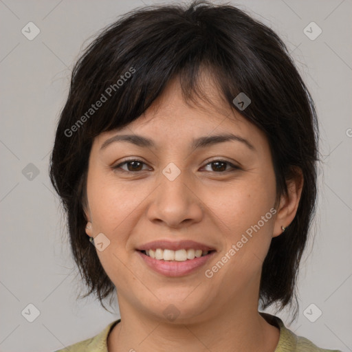 Joyful asian young-adult female with medium  brown hair and brown eyes