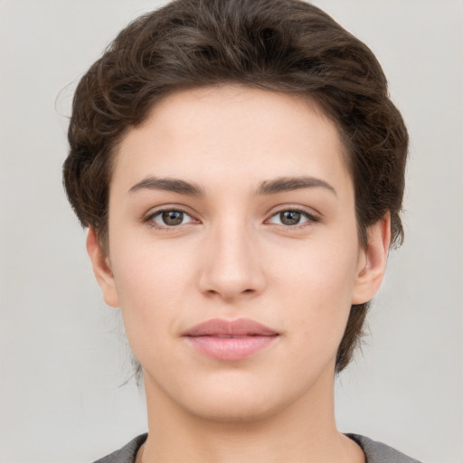 Neutral white young-adult female with short  brown hair and brown eyes