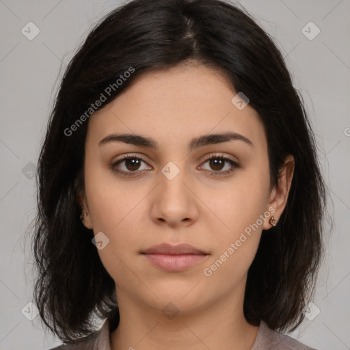 Neutral white young-adult female with medium  brown hair and brown eyes