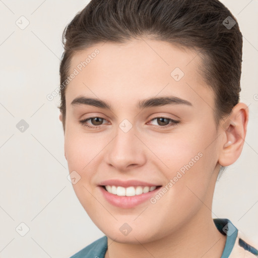 Joyful white young-adult female with short  brown hair and brown eyes