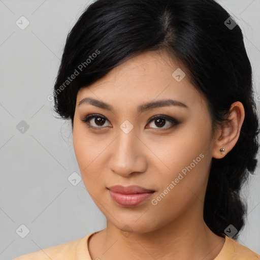 Joyful asian young-adult female with medium  black hair and brown eyes