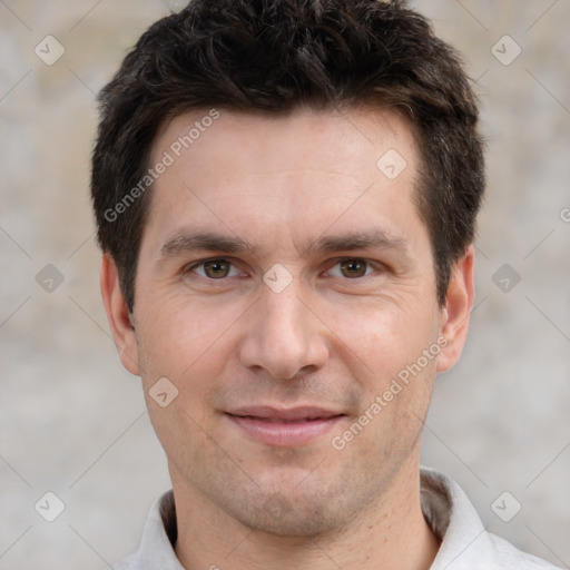 Joyful white adult male with short  brown hair and brown eyes