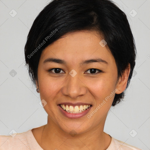 Joyful asian young-adult female with medium  black hair and brown eyes