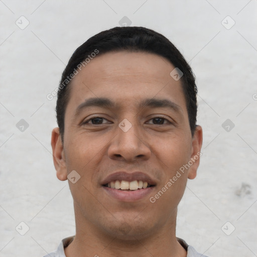 Joyful white young-adult male with short  black hair and brown eyes