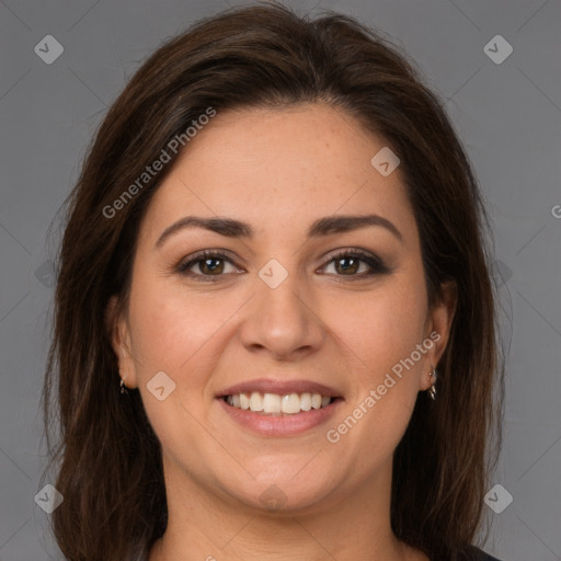 Joyful white young-adult female with long  brown hair and brown eyes