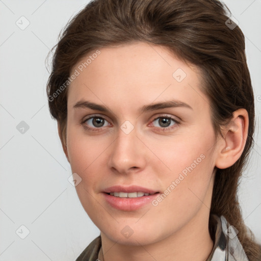 Joyful white young-adult female with medium  brown hair and grey eyes