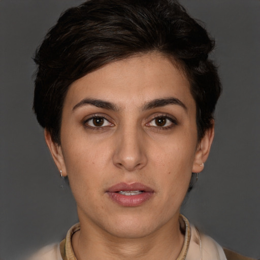 Neutral white young-adult female with short  brown hair and brown eyes