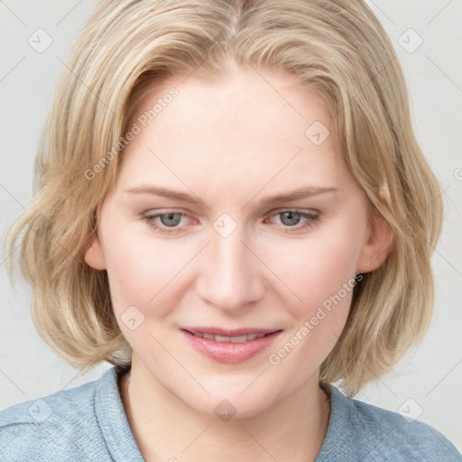 Joyful white young-adult female with medium  brown hair and blue eyes