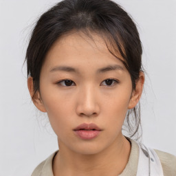 Neutral asian young-adult female with medium  brown hair and brown eyes